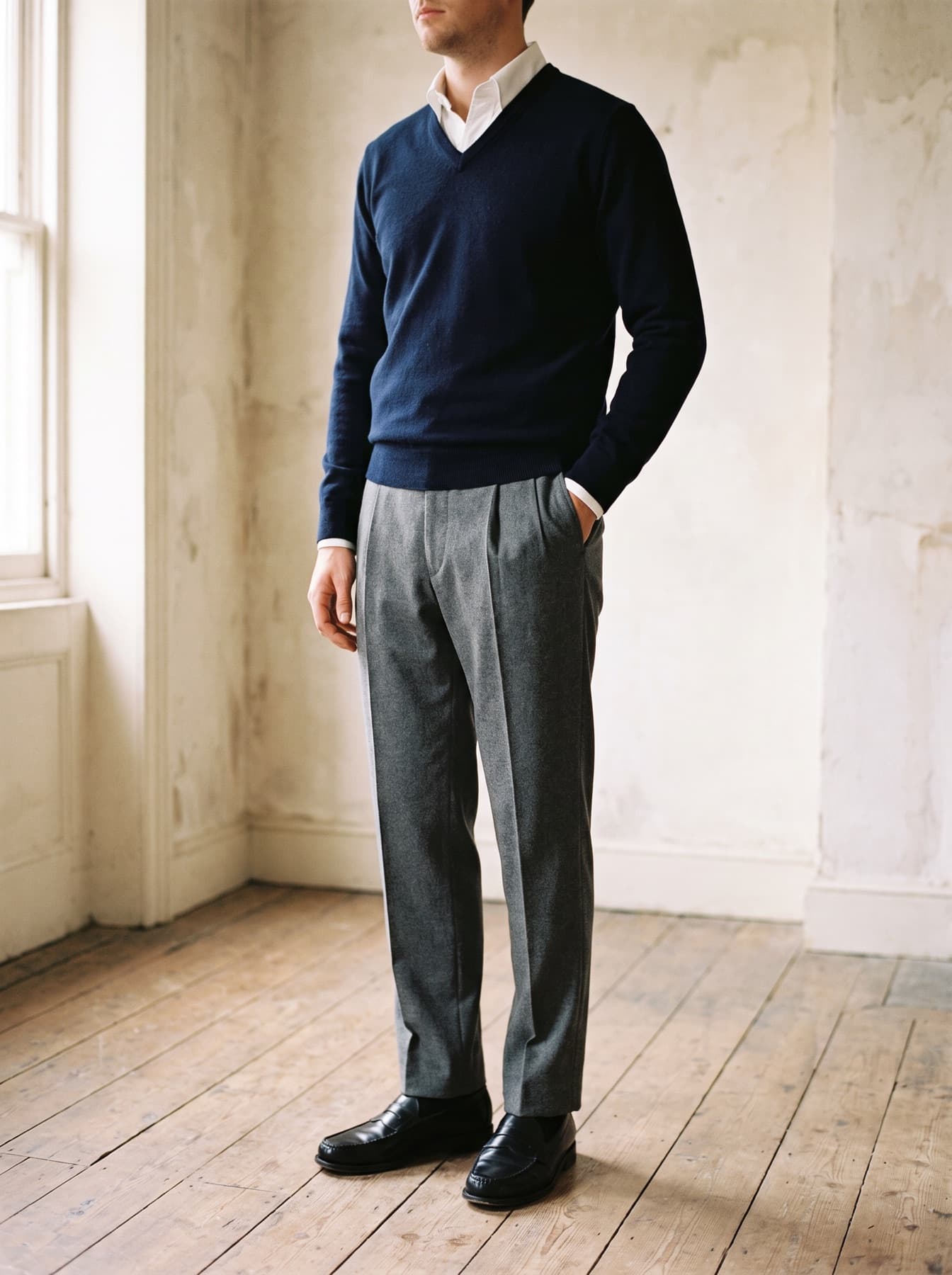 Reference: navy sweater, white shirt and grey trousers